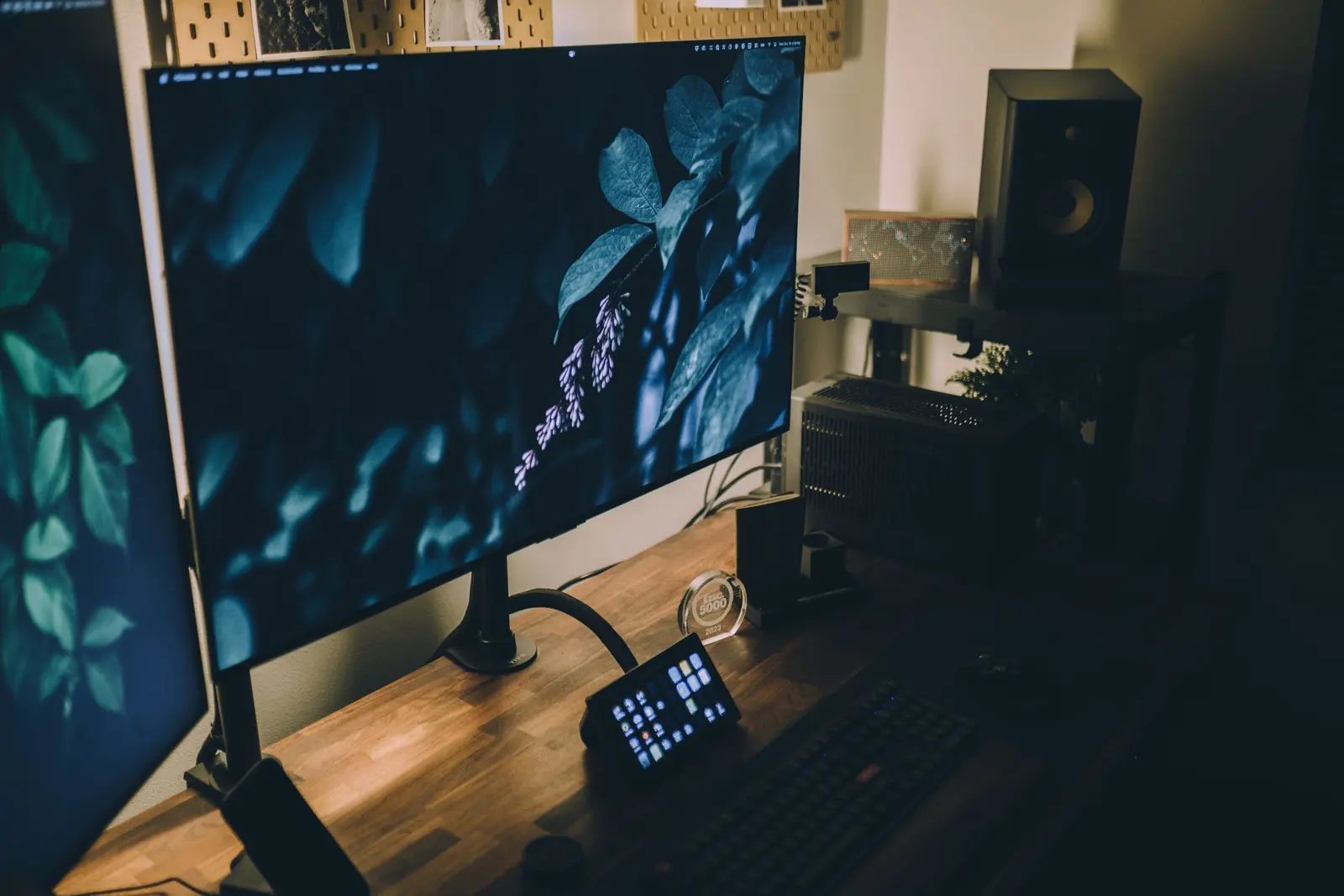 A desk with two computer monitors for comparing documentation systems