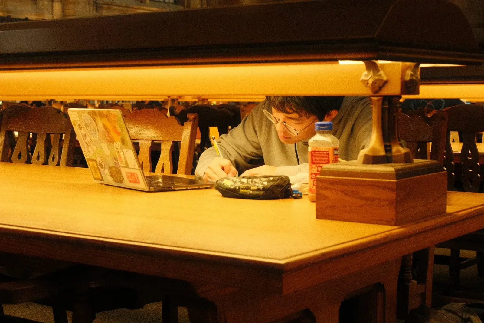 Student checking a digital textbook offer before buying